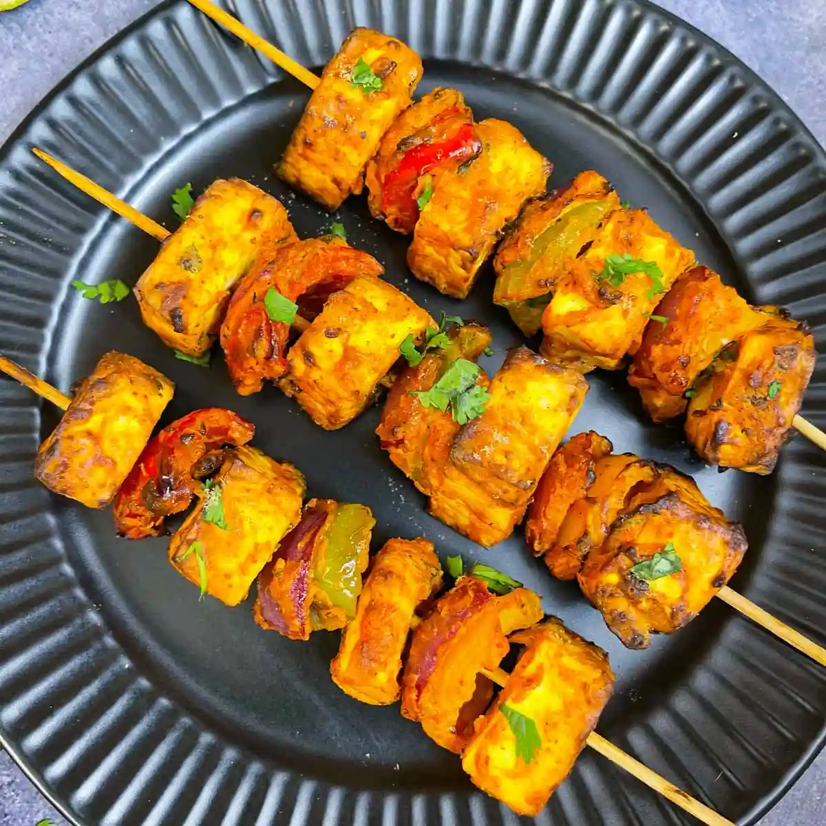 Paneer Tikka with colorful presentation